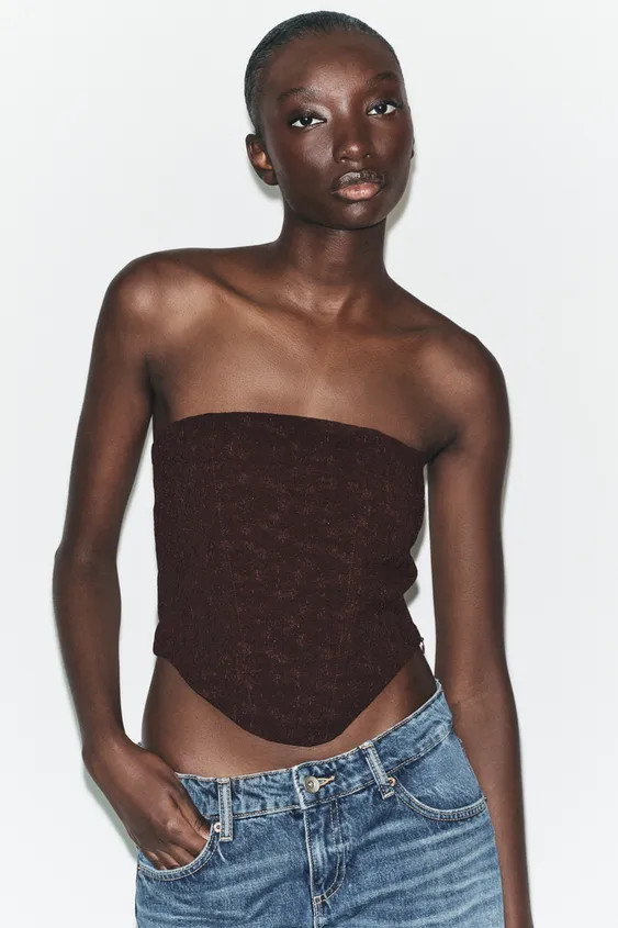 Top with a straight neckline and off-the-shoulder design. Featuring textured fabric detail, inter... | Zara UK