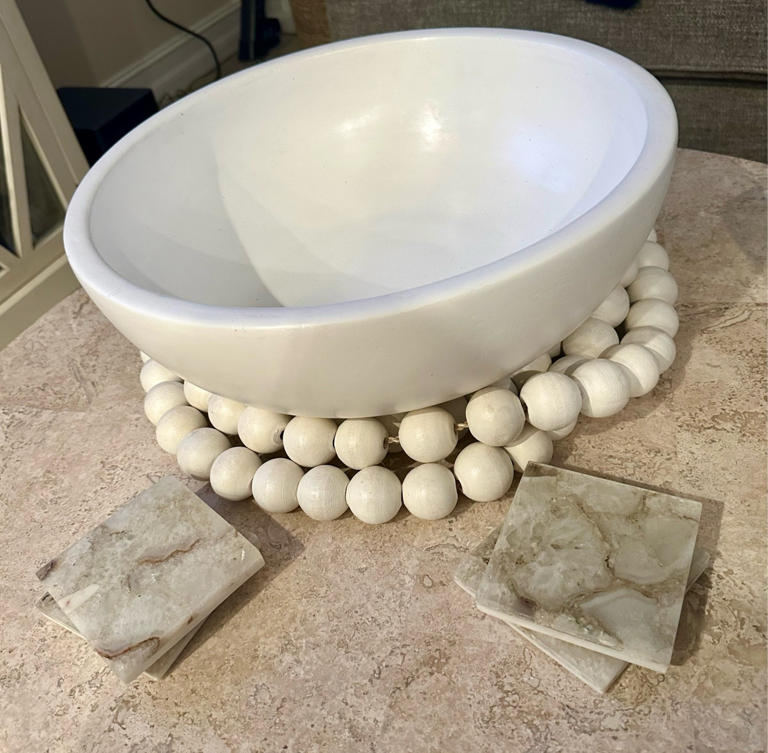 Living room decor catch all bowl with decorative large beads and marble coasters

#LTKU #LTKGiftGuide #LTKHome