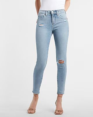 Mid Rise Light Wash Ripped Raw Hem Skinny Jeans | Express