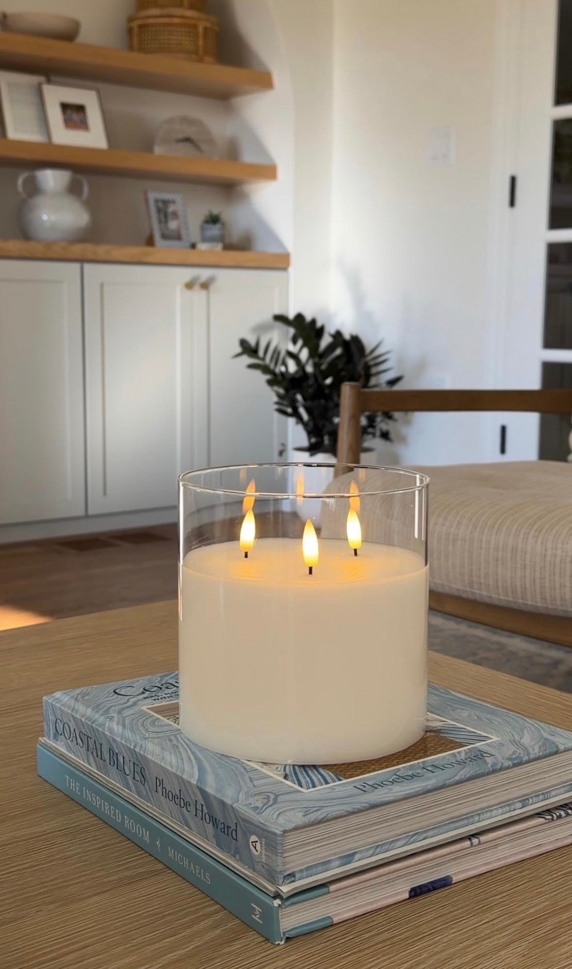 This large 3 wick battery operated candle adds the perfect ambiance to our family room coffee table!

#LTKHome