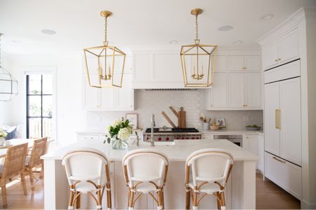 Save 20% on our kitchen counter stools, breakfast nook dining chairs, and chandelier with code upgrade. White kitchen, coastal kitchen design, home decor, island kitchen pendant lights, 

#LTKsalealert #LTKhome #LTKFind