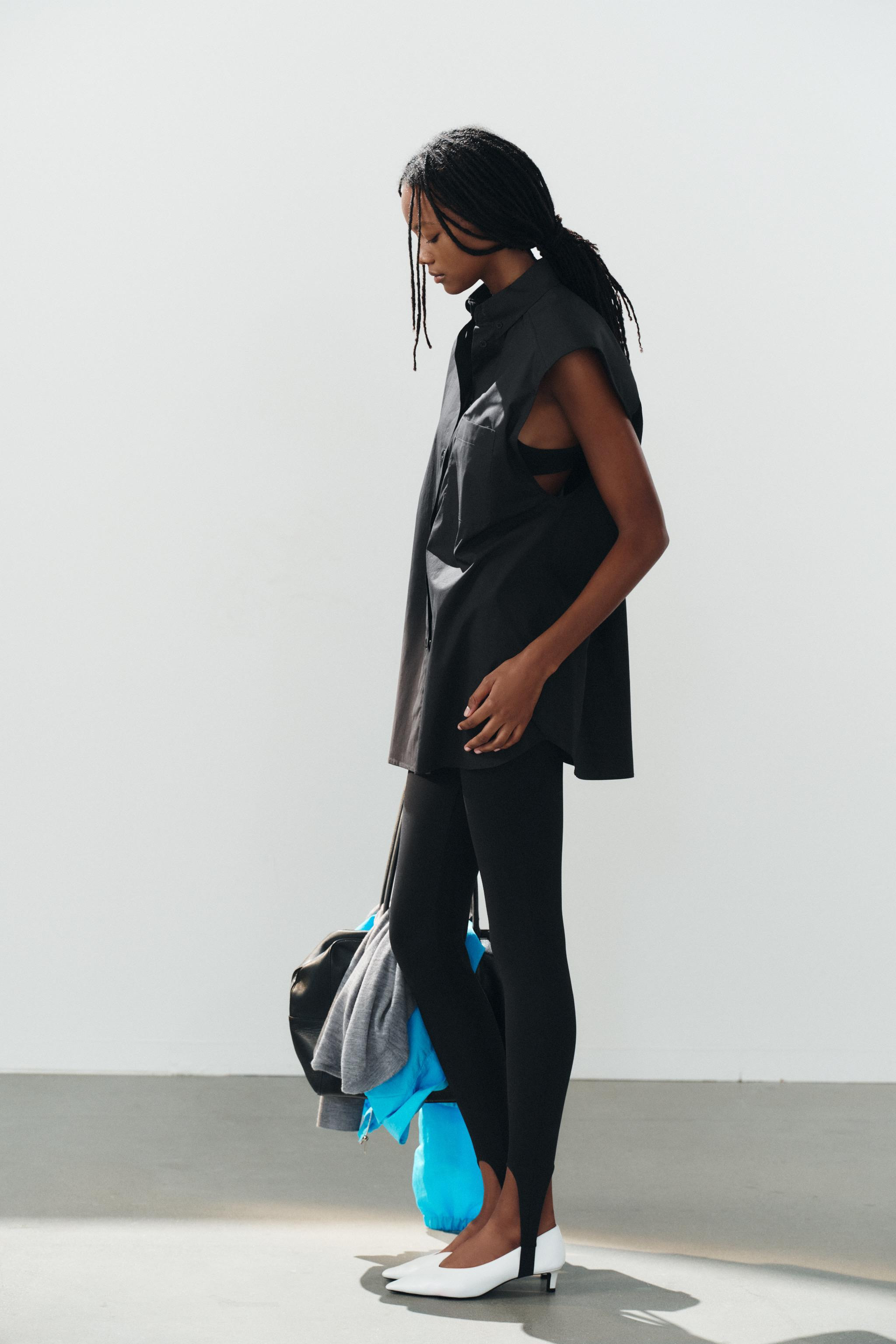 Oversized shirt featuring a lapel collar and sleeveless design. Front patch pocket. Button front ... | Zara US