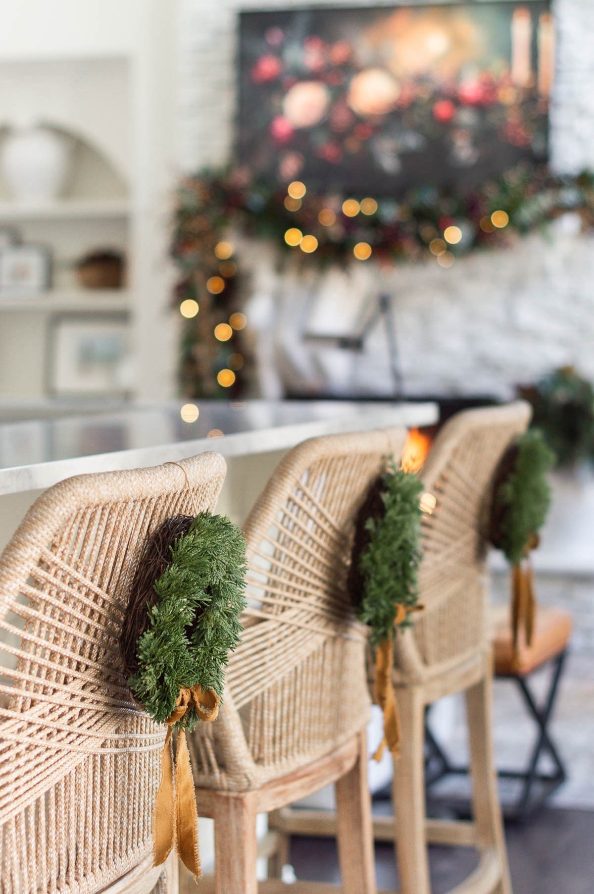 Simple holiday touches, like adding small green wreaths and bows to the backs of bar stools or chairs, add a little bit is extra Christmas magic to your home. home decor Christmas decor woven bar stools kitchen decor 

#LTKHome #LTKFindsUnder50 #LTKHoliday