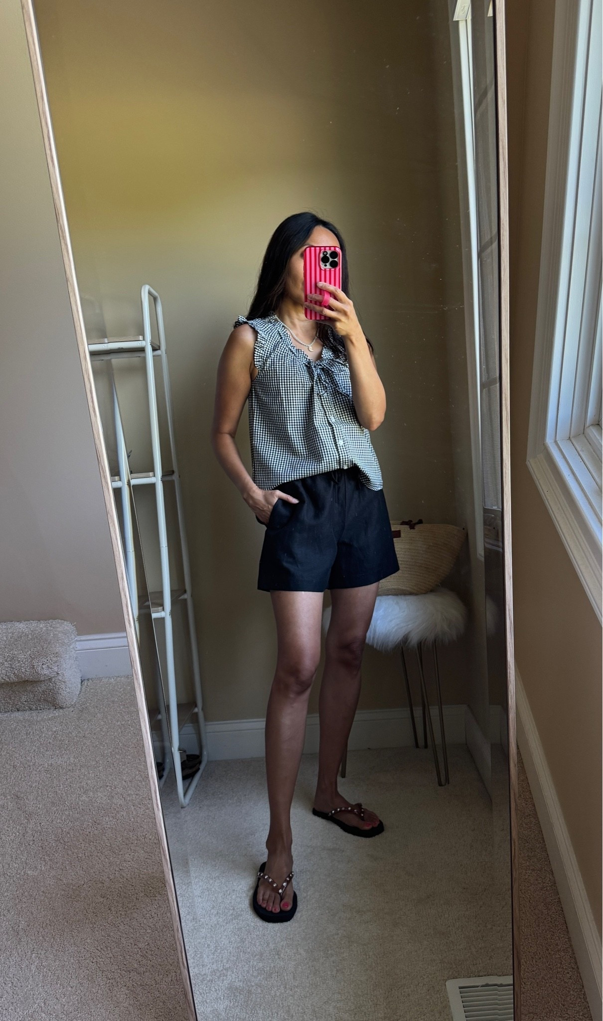 Summer outfit. Vacation outfit. 
Top looks so chic and feminine. Adjustments tie neck. Cotton lightweight material. Tuck or untuck. Other colors also available. 
True to size here. Cut is generous. Size down if in between. 
Linen blend elastic waist shorts. True to size. Size up if in between. 
Summer beaded shell necklace. 
Embellished rhinestone flip flops

#LTKOver40 #LTKTravel