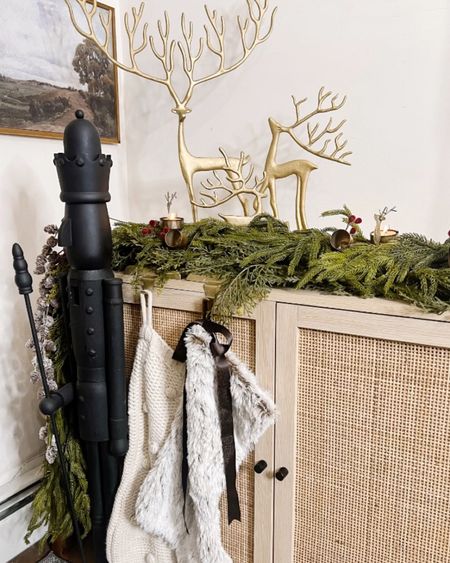 Holiday Tv console styling, cedar garland, gold reindeer, diy nutcracker 

#LTKHoliday #LTKhome #LTKSeasonal
