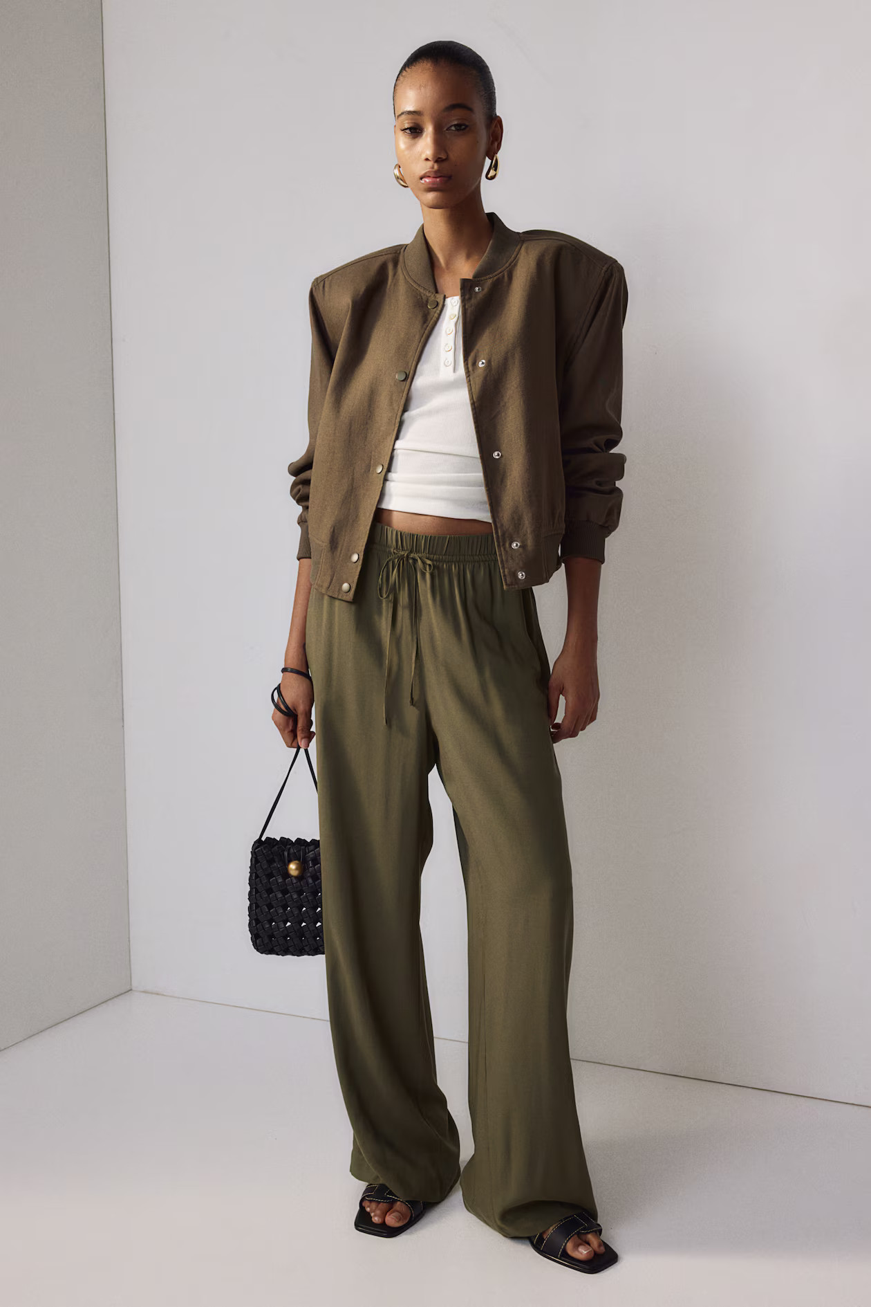 Wide pull-on trousers - High waist - Long - Dark khaki green - Ladies | H&M GB | H&M (UK, MY, IN, SG, PH, TW, HK)