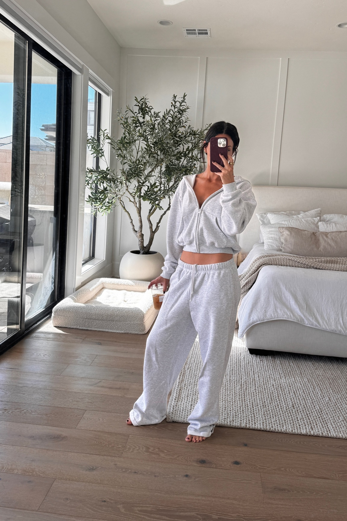 Wide leg sweatpants are my vibe lately. I truly live in all things skims. If you’re looking for quality loungewear, you can’t go wrong. I’m wearing a size small in both top and bottom. Other styles in this fabric and color linked as well. Perfect to mix and match these loungewear sets  