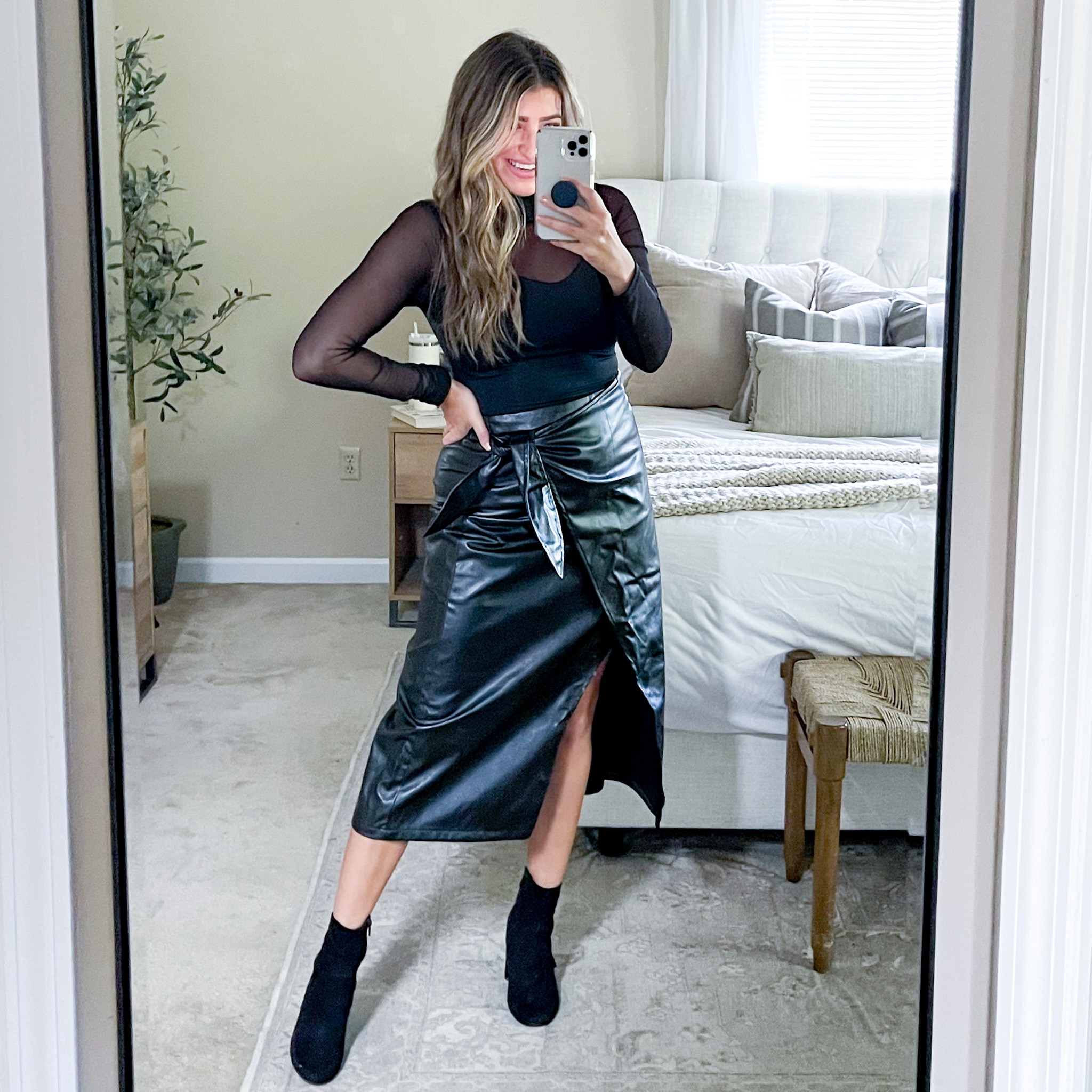Amazon leather skirt and black mesh bodysuit. Use code 10LAUREN1 for 10% off. Wearing size medium in both!

#LTKsalealert #LTKstyletip #LTKSeasonal