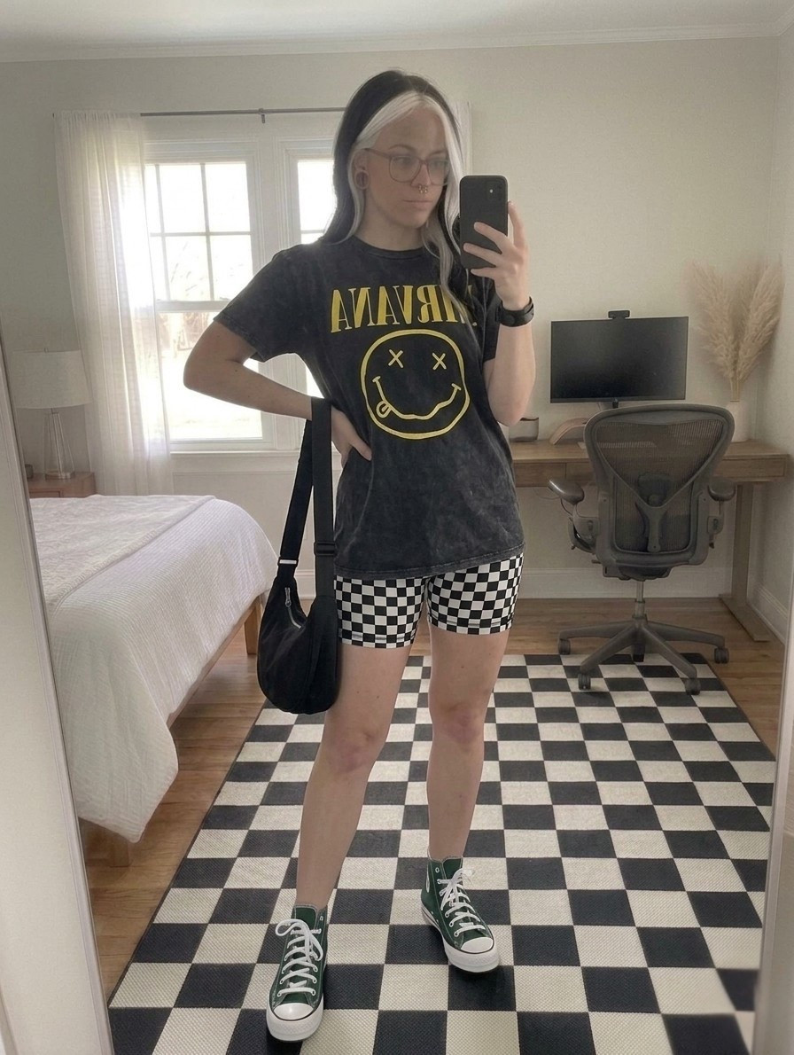 Obsessed with this mix of textures and patterns for an effortless everyday look. I’m pairing a vintage wash Nirvana graphic tee with high waisted checkerboard biker shorts to balance that oversized vs. fitted silhouette. Finished the look with my go to forest green high top Chucks and a slouchy black hobo bag.

This outfit is perfect for coffee runs or a casual concert vibe. Everything fits true to size. I am linking the exact pieces and some budget friendly alternatives below!

#LTKootd #LTKmomlife #LTKSeasonal