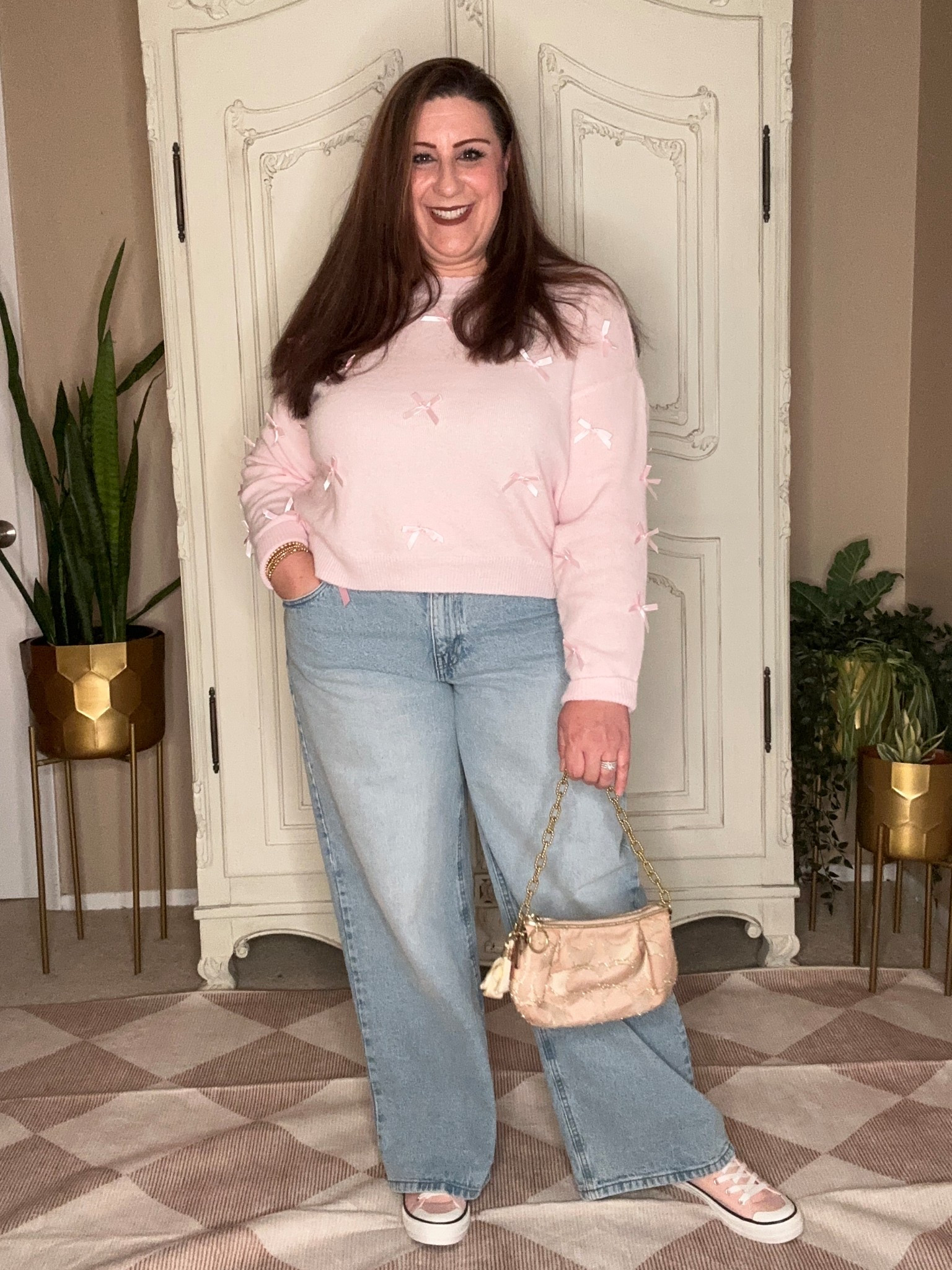 I wish you could feel how soft & light this pink sweater is. It’s like wearing a cloud ☁️. It also comes in a cream color too. The bow details & loose fit jeans instantly brought me back to the 90’s. I forgot how much I missed this style! These two items cost me under $40 total which is hard to find in this economy. 

For ref. I’m a size 18 & I’m wearing:
XL 16-18 in the sweater 
16 Jeans

Say “ bow trend “ to get the 🔗 or ✅ my LTK @StylingCurves

#affordablefashion #affordstyle #bougieonabudget #stylefind
#bowtrend #viralsweater #walmartfashion #walmart
#prettyinpink #pinkoutfit
#walmartbowsweater #walmartbowjeans #streetstyle #teacheroutfit #teacherootd #styleinspo #howtostyle #personalstylist #fashioninfluencer #styleinfleuncer #walmartcreator #walmartstyle #walmartfinds #jeansoutfit #casualoutfit #winterputfit #pinksweater #styleover40
#LTKMidsize #LTKPlusSize #LTKOver40

#LTKFindsUnder50 #LTKmomlife #LTKootd