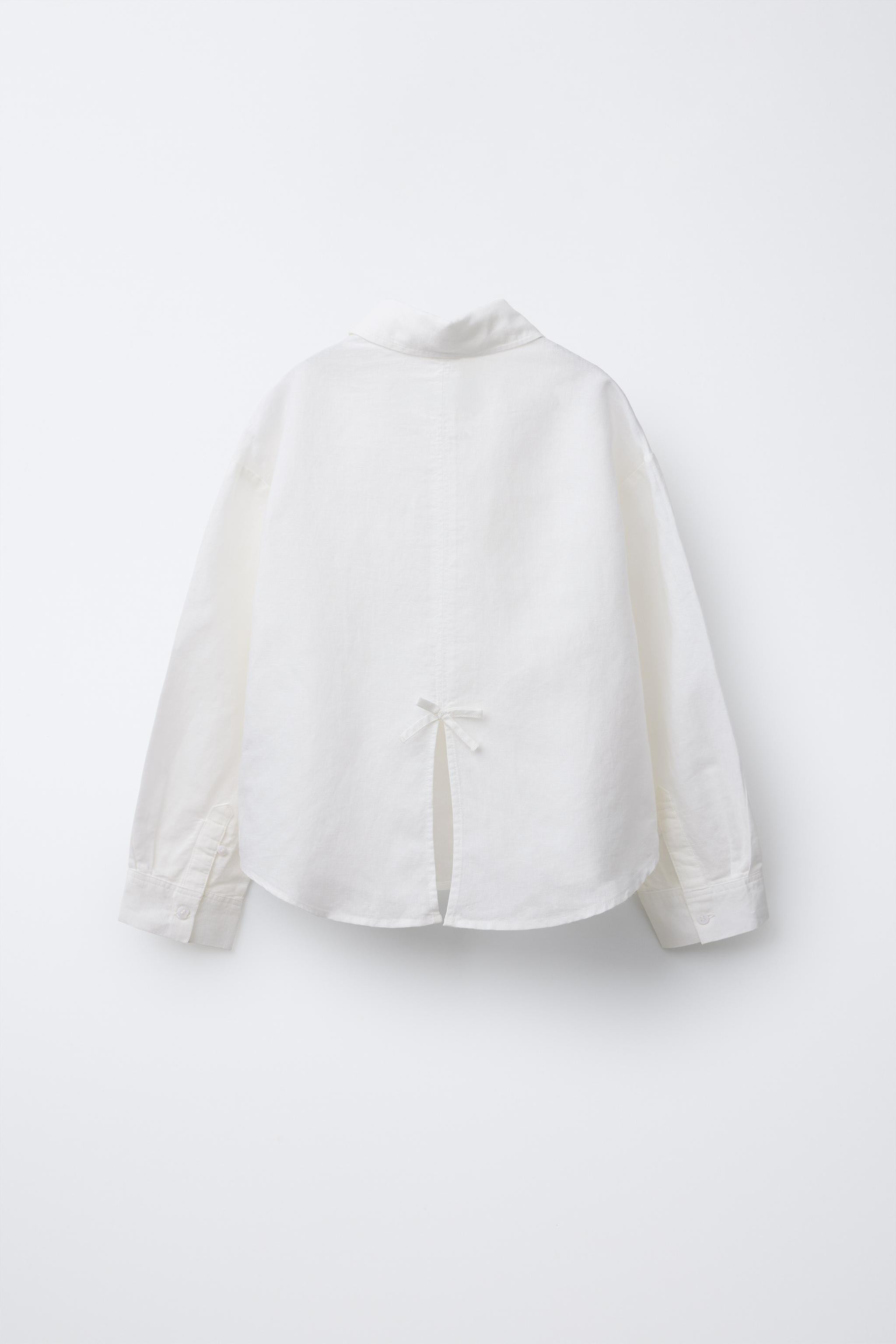 Shirt with shirt collar and long sleeves finished with button closure. Front button closure. Patc... | Zara US