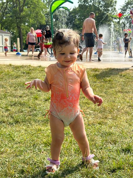 splash pad fun day // rashguard half zip swimsuit for toddler girl with first walker sandals

#LTKkids #LTKSeasonal #LTKbaby
