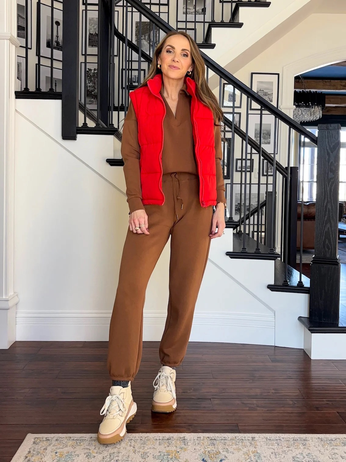 @spanx Lounge set (use code MERRICKXSPANX for 20% off + free shipping) + red vest + @sorel winter boots 

#LTKStyleTip #LTKTravel #LTKShoeCrush