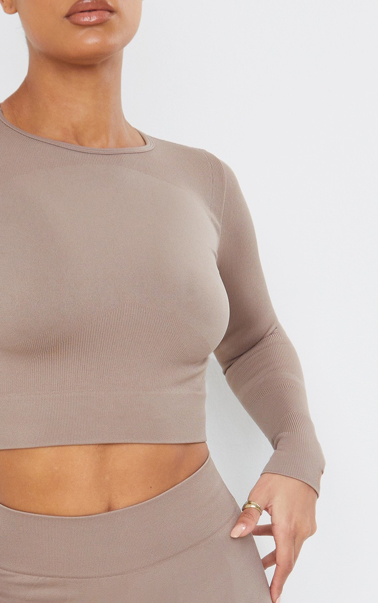Taupe Seamless Long Sleeve Rib Detail Sports Top | PrettyLittleThing US