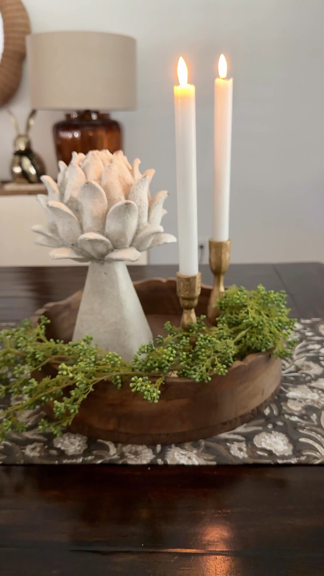 Good things really do come in smaller packages! 

If you’ve been thinking you need a big tray to make a statement…you don’t. Sometimes a smaller tray creates the prettiest, most intentional look. I kept this one simple with a beautiful artichoke, some greenery ,and a couple of candles. 

It’s proof that a few well-chosen pieces can feel just as full, cozy, and elevated as a larger display.