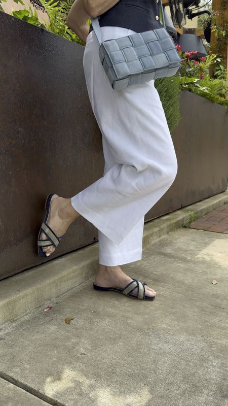 Warm weather calls for linen pants a lightweight vest ( especially if you are short waisted)  Hint .   
they will elongate your torso
Cute flat sandals and a crossbody are all you need. Oh!  Don’t forget Uber cool sunglasses 

#LTKSeasonal #LTKshoecrush #LTKstyletip