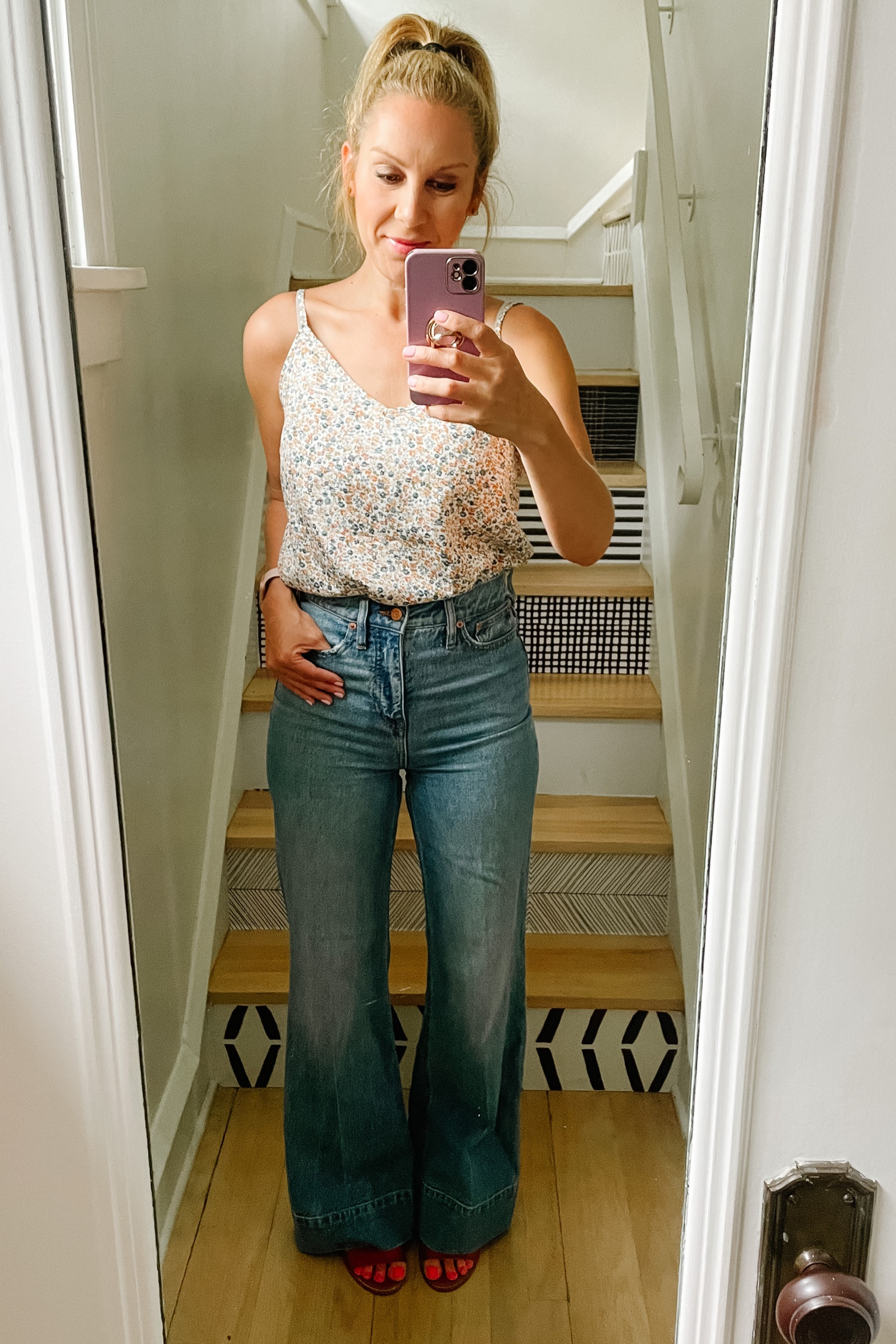 Loving this floral cami. It has a cute tie in the back and looks great tucked with jeans. 

#LTKsalealert #LTKstyletip #LTKtravel