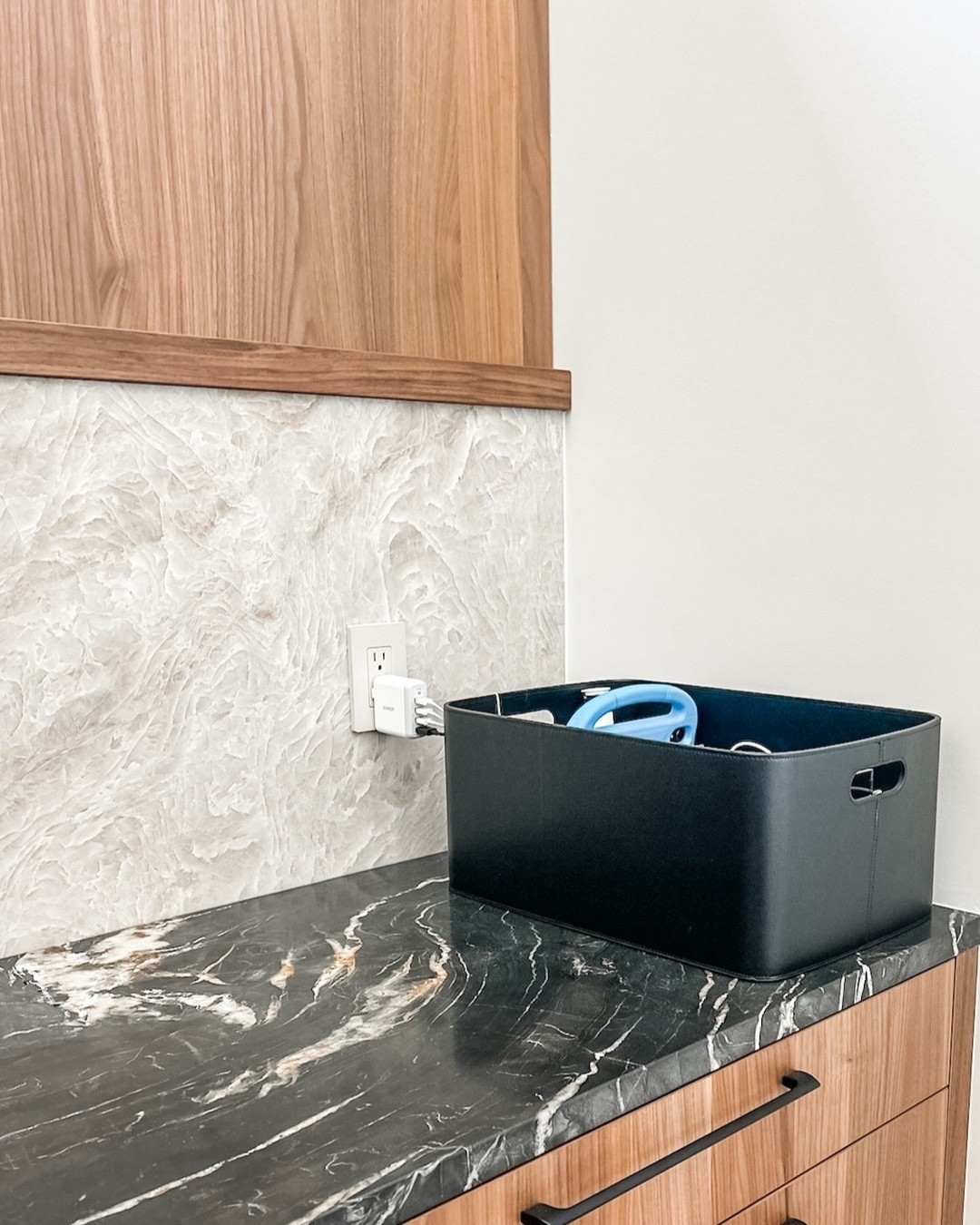 Week six of the school year is underway and if your house is anything like ours the electronics (and the precious papers) have taken over every inch of counter space! 😂

We love how this luxe leather bin with a clutch organizer tucked inside keeps everything hidden and fully charged, while allowing the beauty of our client’s countertops to shine. 

Curious what our favorite organizing tools are? We've linked them all for your over on @ltk