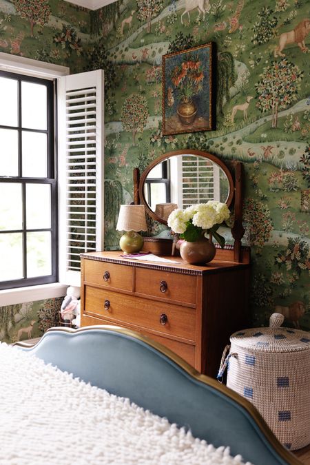 Polly’s Room 🖤

Vintage dresser, lamp with rattan shade, lidded hamper basket, blue velvet and brass bed, morris wallpaper, floral vintage art, boucle throw

#LTKhome #LTKSeasonal