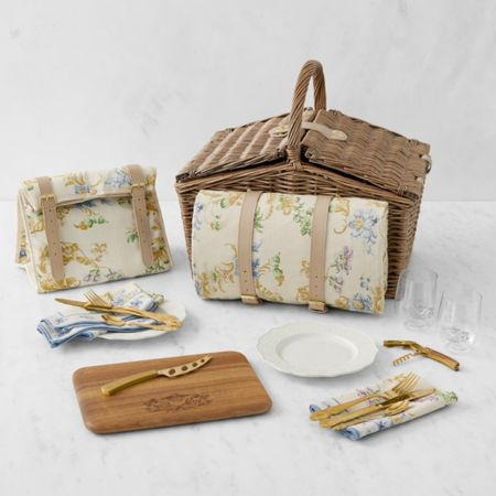 Bridgerton Picnic Basket. Regency inspired floral and style. Full service for two includes ceramic plates, brass-finished stainless-steel forks, knives and spoons, fork-tipped cheese knife, acacia wood cheese board, stemless wine glasses, poly-cotton napkins and picnic blanket. So lovely!

#LTKSeasonal #LTKHome #LTKParties