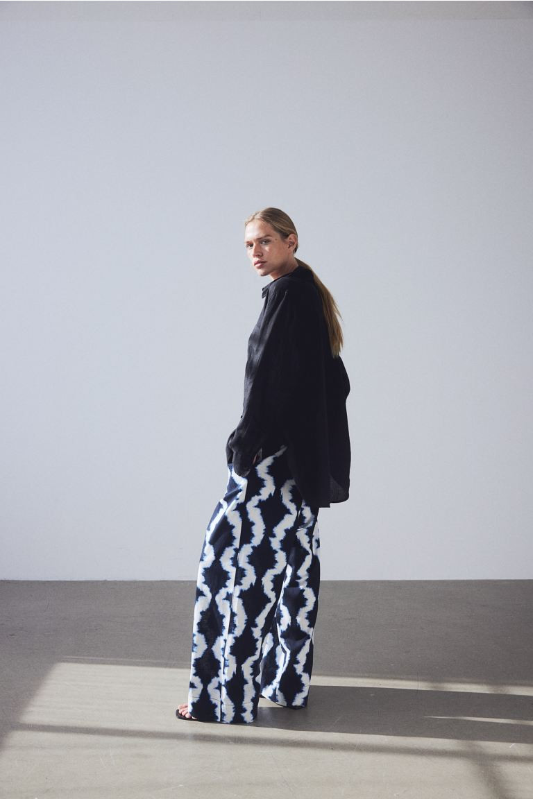 Wide linen-blend trousers - Navy blue/Patterned - Ladies | H&M GB | H&M (UK, MY, IN, SG, PH, TW, HK)