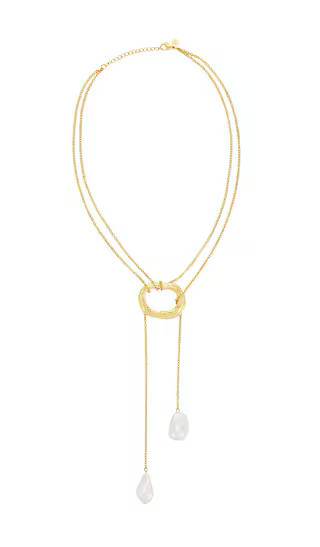petit moments Solar Necklace in Metallic Gold. | Revolve Clothing (Global)