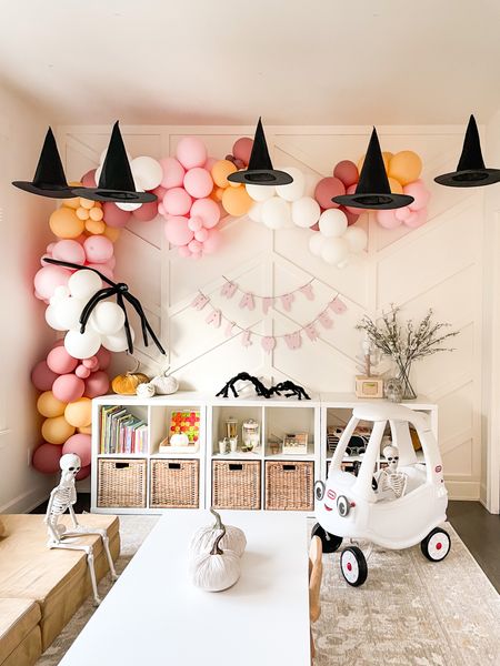 Halloween playroom for toddler, hanging witches hats, balloon garland, hair spiders, skeletons, Halloween decor, spooky decor for kids, toddler play table, playroom rug, playroom storage 

#LTKhome #LTKHalloween #LTKkids
