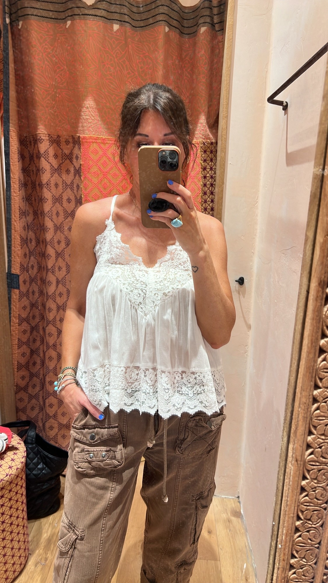 Free People Cami.  Wearing small  

#LTKStyleTip #LTKFindsUnder50 #LTKOver40