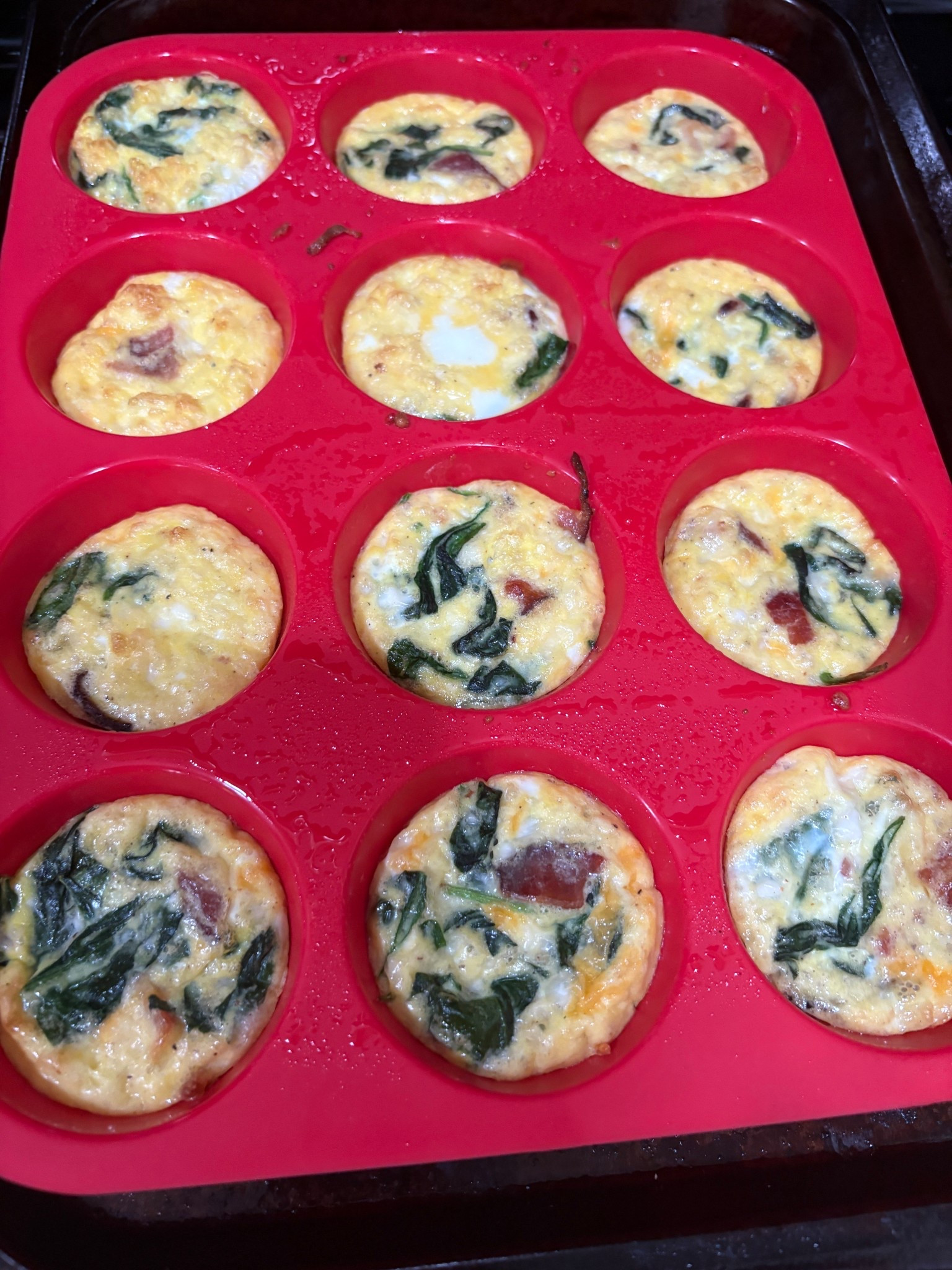 I’m obsessed with making egg bites and this silicone muffin tin makes it so easy. Spray with a little avocado oil and they pop right out.

For recipe:
Cook bacon and sautee spinach 
Put in a mixing bowl, mix in 8 eggs, 1/3 cup egg whites, 1 cup cottage cheese, garlic salt, pepper, a little cheese 
Bake at 350 for 25 minutes 