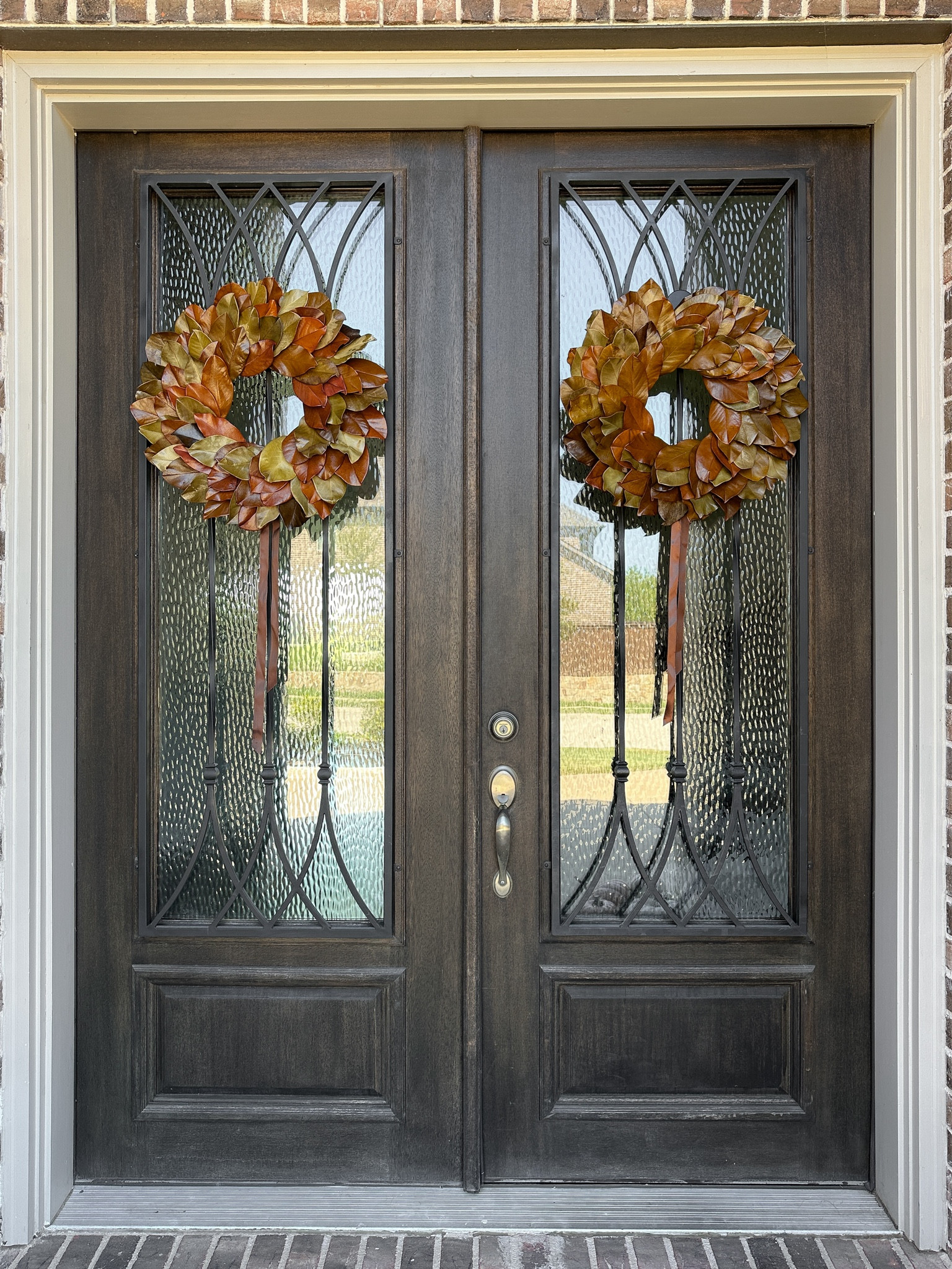 Magnolia leaf fall porch wreaths from target using Amazon ribbon and wreath hangers

#LTKStyleTip #LTKHome #LTKSeasonal