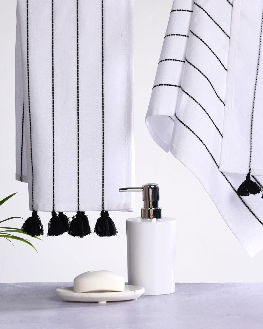 Boho Hand Towels with Tassels for Bathroom Hanging and Decorative, Set of 2, 100% Cotton, 16" x 30" Inches 

• Versatile Use – Set of 2 soft, all-purpose hand towels perfect for bathrooms, kitchens, or holiday décor.
• Soft & Absorbent – Made from pre-washed Turkish cotton for high absorbency and a gentle feel.
• Stylish & Sustainable – Crafted from 100% recycled cotton with tassel accents; 16” x 30” size.
• Great Gift Idea – Makes a thoughtful gift for housewarmings, holidays, or everyday use.
• Easy Care – Machine washable in cold water; fade-resistant and reusable.

#LTKHome #LTKSaleAlert #LTKStyleTip