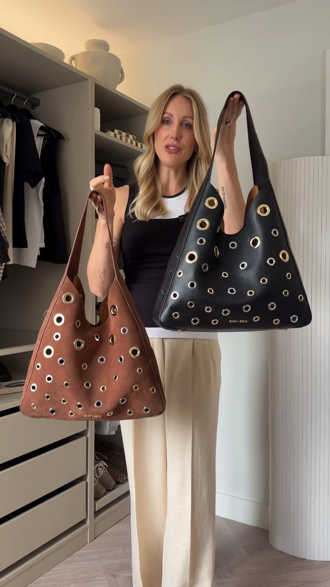 Ad. introducing the Saint + Sofia Allana eyelet handbag 🖤🤎

Wearing layered vest tops (8/10)
Wide leg pants cream (10)

Body measurements: 34/26/37

Tote bag | suede bag | summer outfit | capsule wardrobe basics

#LTKuk #LTKbag