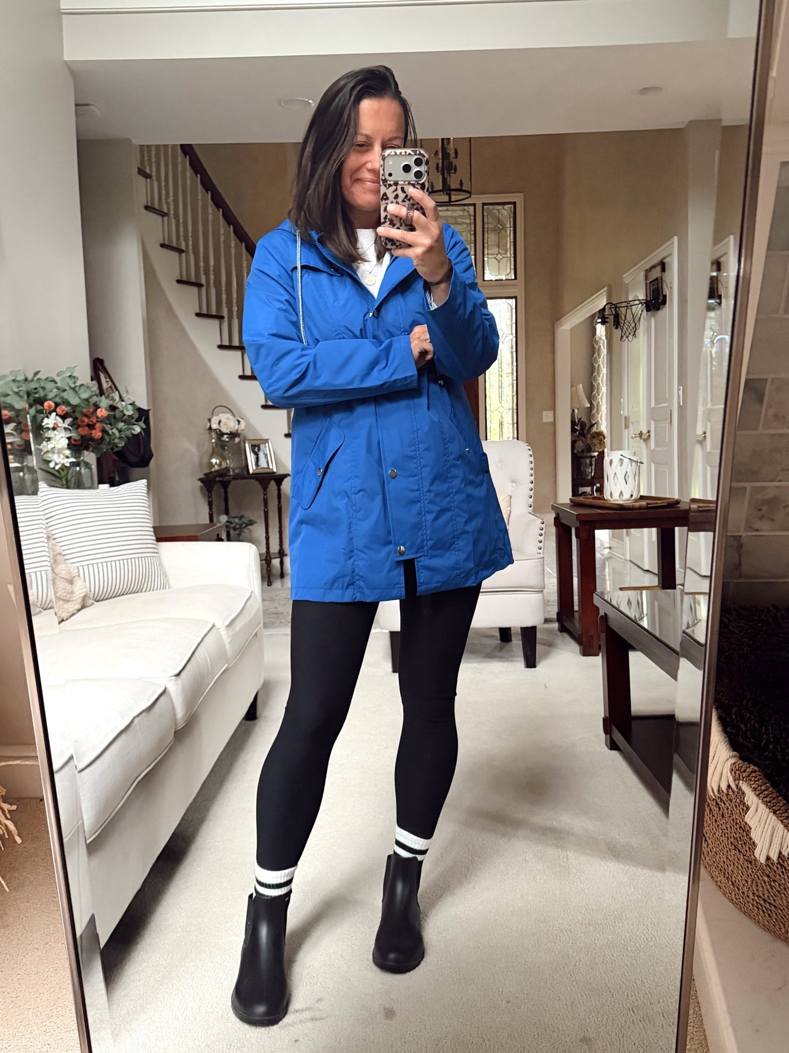 Rainy day outfit! Rain jacket is 100% waterproof and comes in a ton of colors! Fleece lined leggings are a must when it gets cold! Both run true to size!

#LTKootd #LTKmomlife #LTKOver40