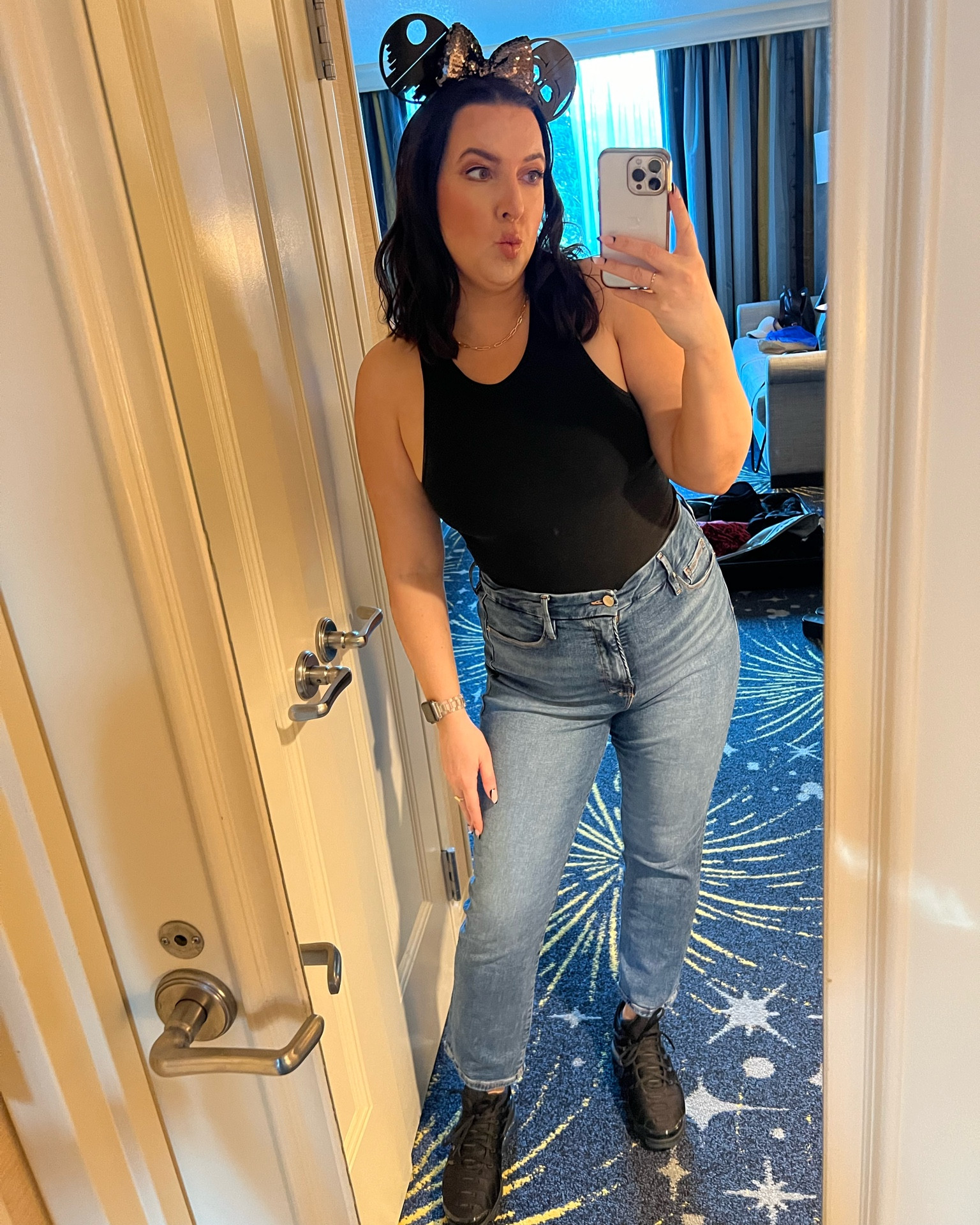 Disneyland outfit / Disney outfit / Star Wars ears / Mickey ears / travel outfit / straight leg jeans / theme park outfit / black crop top 

#LTKTravel #LTKFindsUnder50 #LTKMidsize