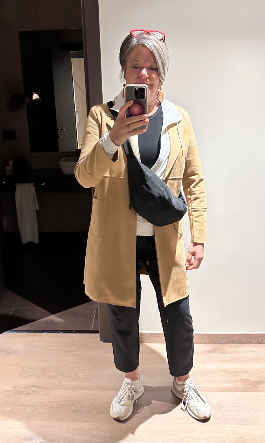 Lightweight raincoat so perfect for travel. Looks great over black t-shirt, white sweatshirt and green golf pants. Don’t forget some comfy @newbalance sneakers. 

#LTKTravel #LTKMidsize