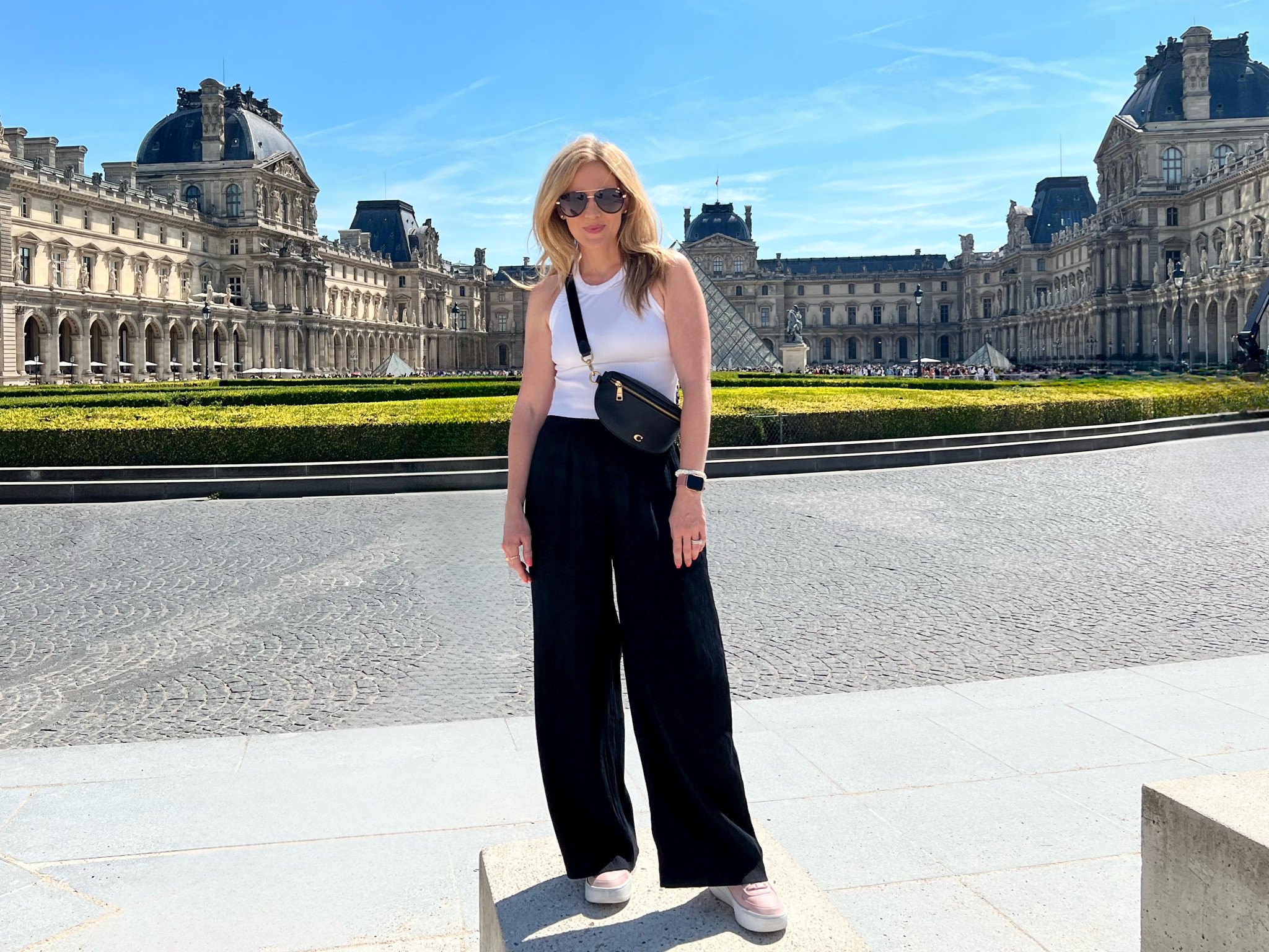 Summer travel look 
Casual summer look 
Sightseeing travel outfit 
Causal summer outfit 
Cropped white tee 
Wide leg black pants 
Nike Air Force one 
Abercrombie wide leg pants 
Quay sunglasses 

#LTKSaleAlert #LTKFindsUnder50 #LTKTravel