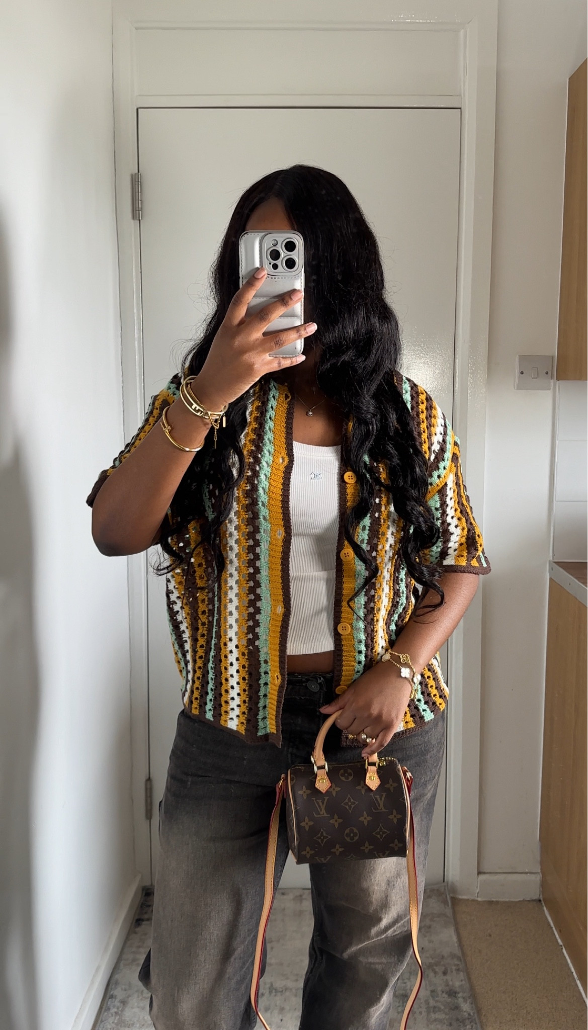 Cardigan size: M
Tank top size: M
Jeans size: 34

#LTKSeasonal #LTKstyletip