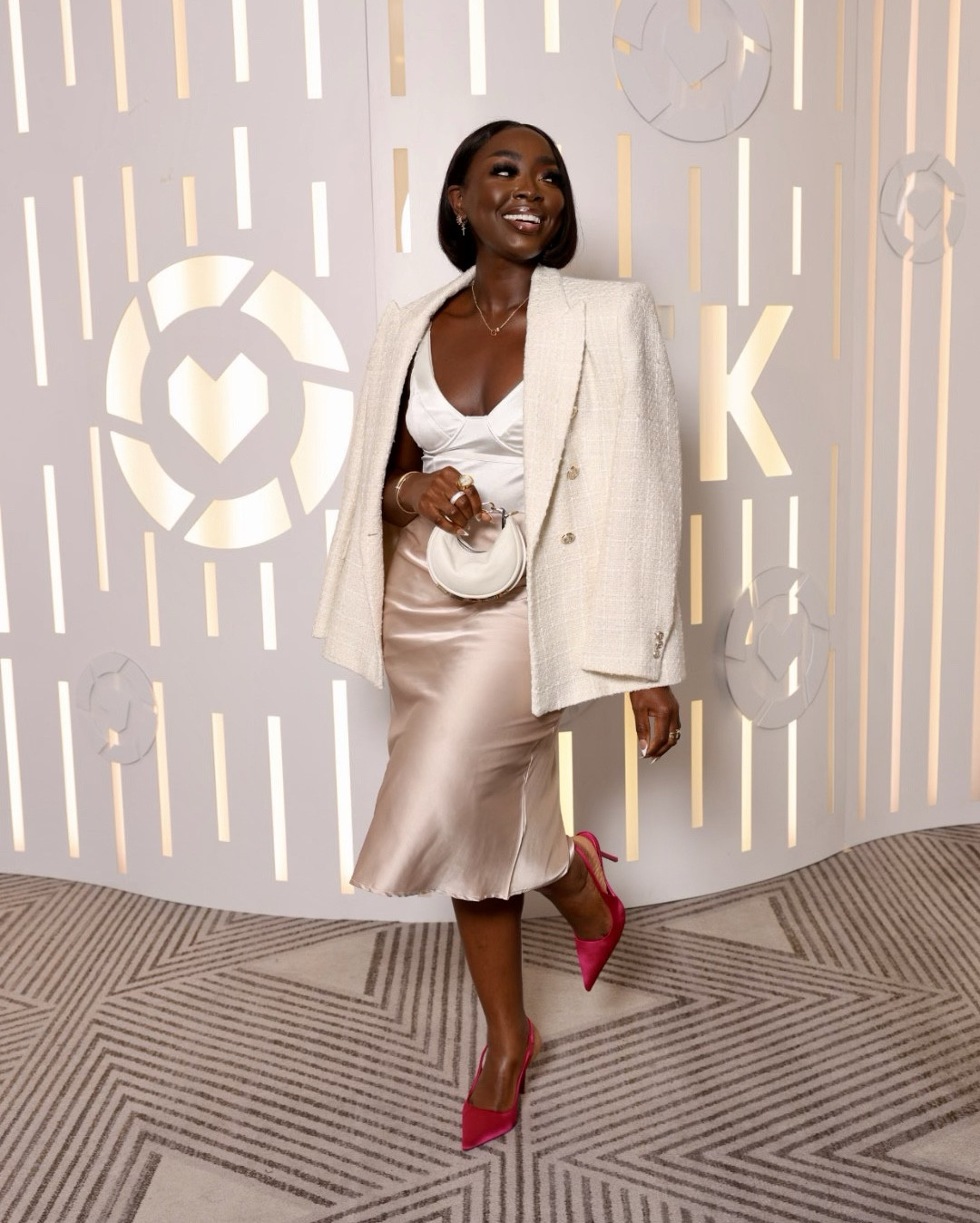 The pop-up color on the shoes just makes me so happy! Not to mention these satin pumps are beautiful. I’m wearing a medium in the skirt (it’s stretchy) and the bodysuit. XL blazer for an oversized look. 

#LTKStyleTip #LTKBeauty #LTKCon