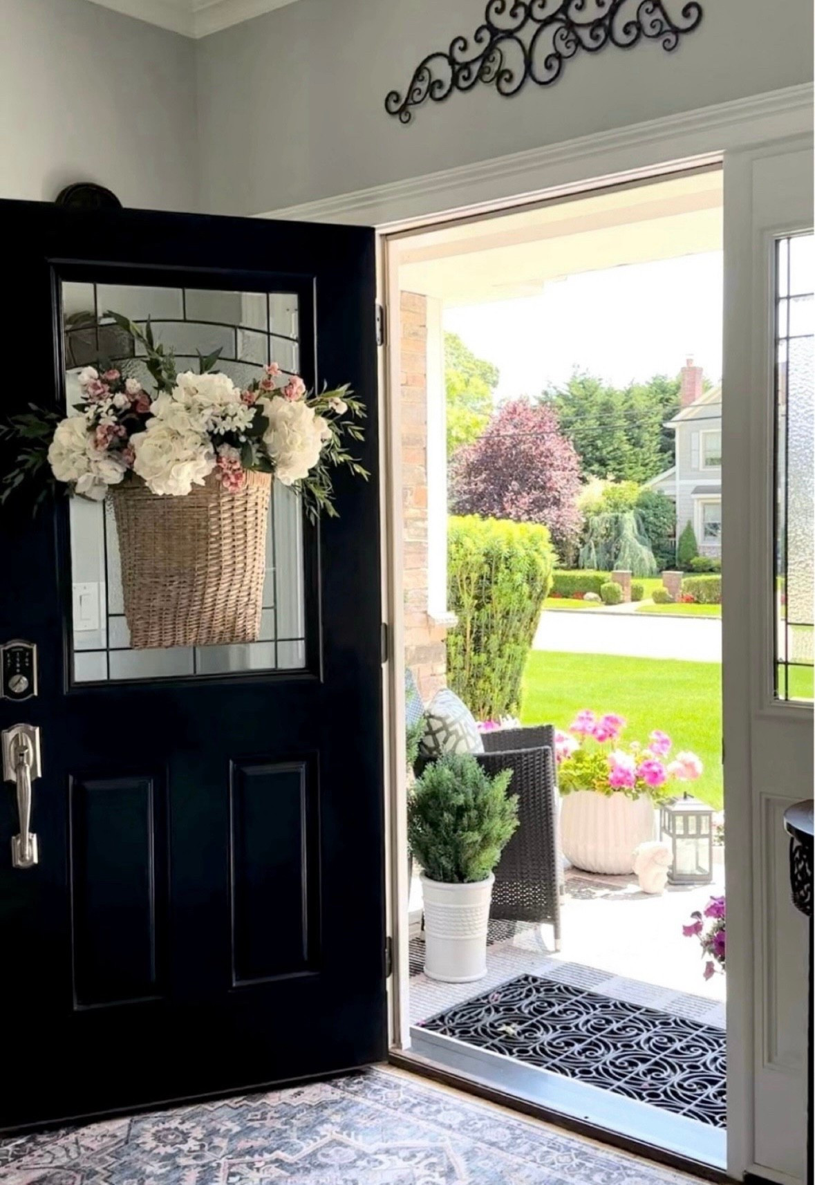 Spring porch styling sales! Shop my hanging basket,, scroll doormat, area rug, lightweight planters, faux potted trees and plants, more planters. Spring/Summer porch accessories. 

#LTKFindsUnder50 #LTKSaleAlert #LTKHome