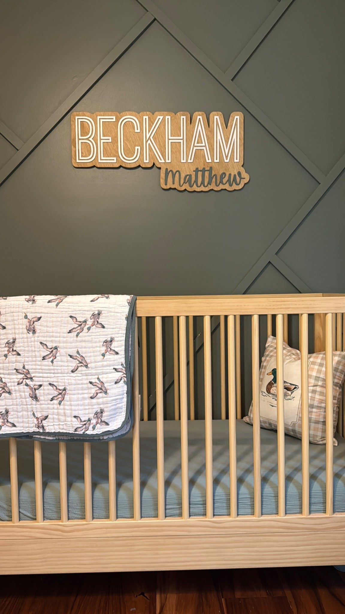 Sneak peek baby boy nursery
Mallard duck / Labrador themed 🦆

Delta crib

Crib bedding, wooden name sign, muslin blanket, natural wood crib 
Woodsy, country, green theme

#LTKBump #LTKHome #LTKBaby