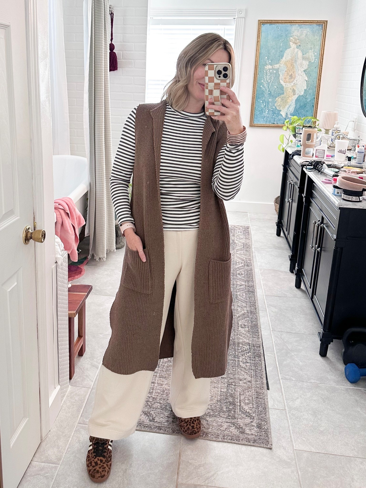 The cutest basic tee under $9 from Walmart!  Wide leg, sweat pants, leopard sneakers, long vest cardigan 


#LTKWorkwear #LTKFindsUnder50 #LTKTravel