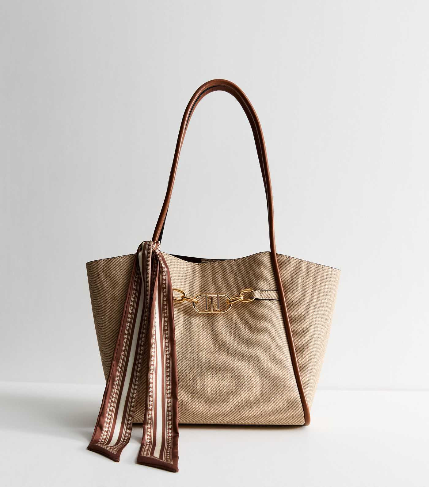 Stone Rolled Seam Faux Leather Tote Bag
						
						Add to Saved Items
						Remove from Saved I... | New Look (UK)