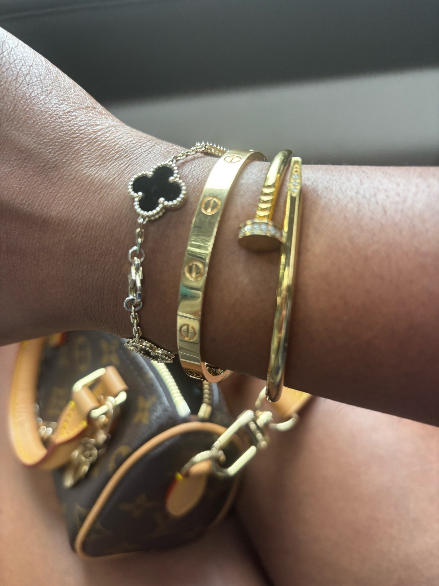 Loving my high-low bracelet stack of the day!! Clover bracelet is from @Etsy (this seller no longer exists but there are other sellers who have similar). Cartier Love Bracelet is authentic. Cartier nail bracelet from Amazon. I’ve linked a few!

#LTKdayinmylife