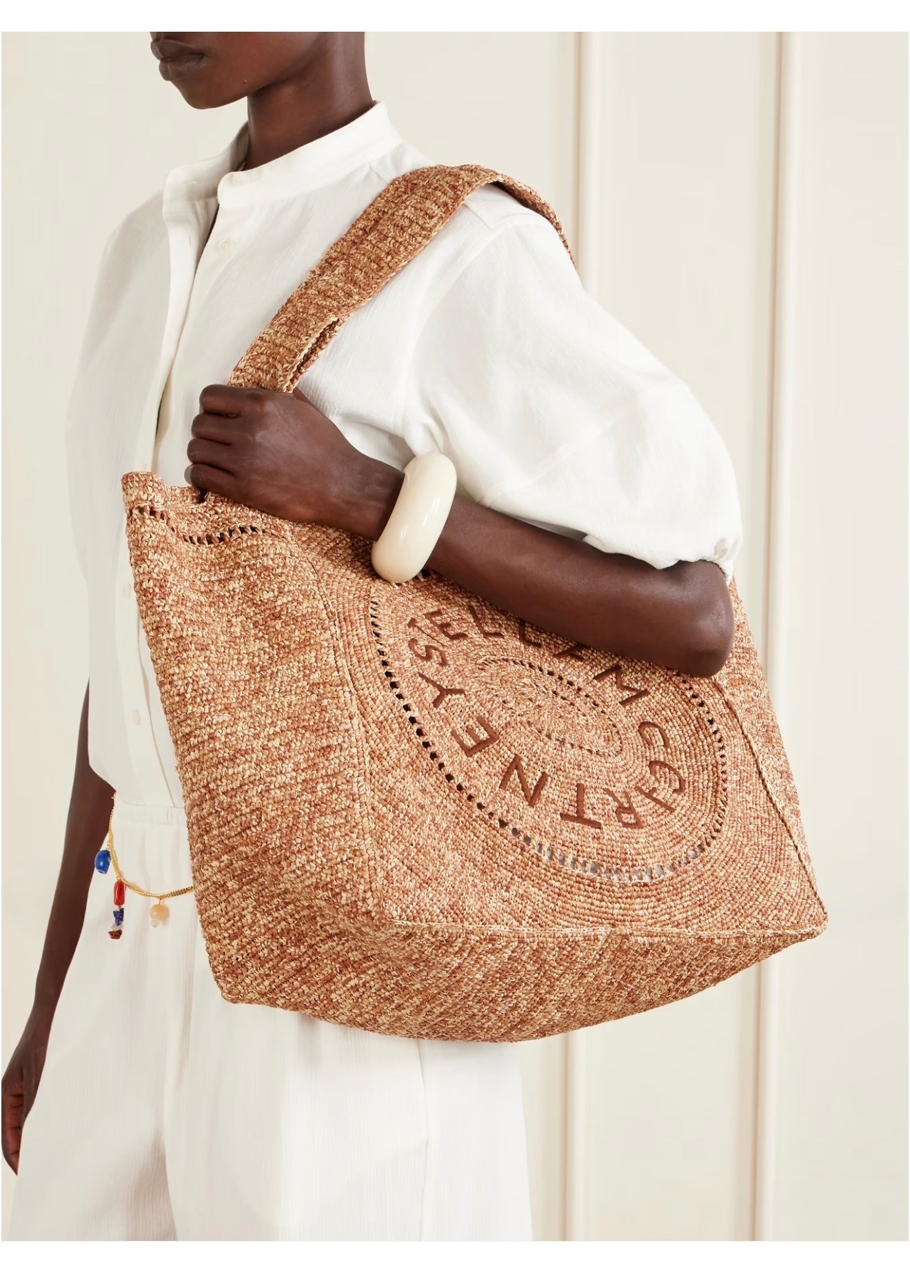 STELLA MCCARTNEY
Logo-embroidered raffia tote bag

Stella McCartney's tote reflects the brand's commitment to considered materials and craft. Woven from raffia, it's embroidered with the label's circular logo and shaped to a spacious silhouette, framed by sturdy top handles

#LTKSeasonal #LTKTravel #LTKWorkwear