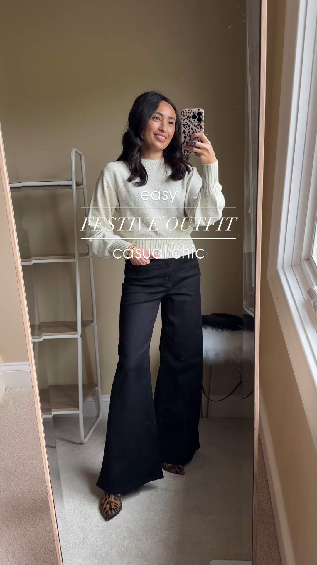 Easy casual chic festive outfit. 
If holiday red isn’t for you, a neutral holiday vibe is just as easy. 
-This embellished sweater has a pretty blousy feel to it. Feels effortlessly fancy with the subtle shimmer from the tiny sequins throughout. True to size for me. On sale for $36. 
-Black jeans that can pass for dress pants if you don’t really want or need dress pants. The high-waisted, wide leg silhouette is a flattering fit and feels elevated. Stretchy denim material.  True to size and in regular length here; could also wear petite length for flat shoes. On sale for $48. 
-Simple gold jewelry for more shimmer. 
-Leopard print shoes for interest. 


#LTKFindsUnder50 #LTKHoliday #LTKOver40