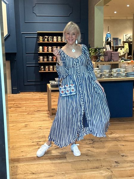 Long sleeve sweetheart stripe midi dress. 
Wear with sneakers or white sandals or even a short white cowboy boot. Size down if you have narrow shoulders. I am wearing a small. 
Blue daisy beaded baguette bag 
Anthropologie spring sale
Resort wear 
Travel 

#LTKover40 #LTKstyletip #LTKSpringSale