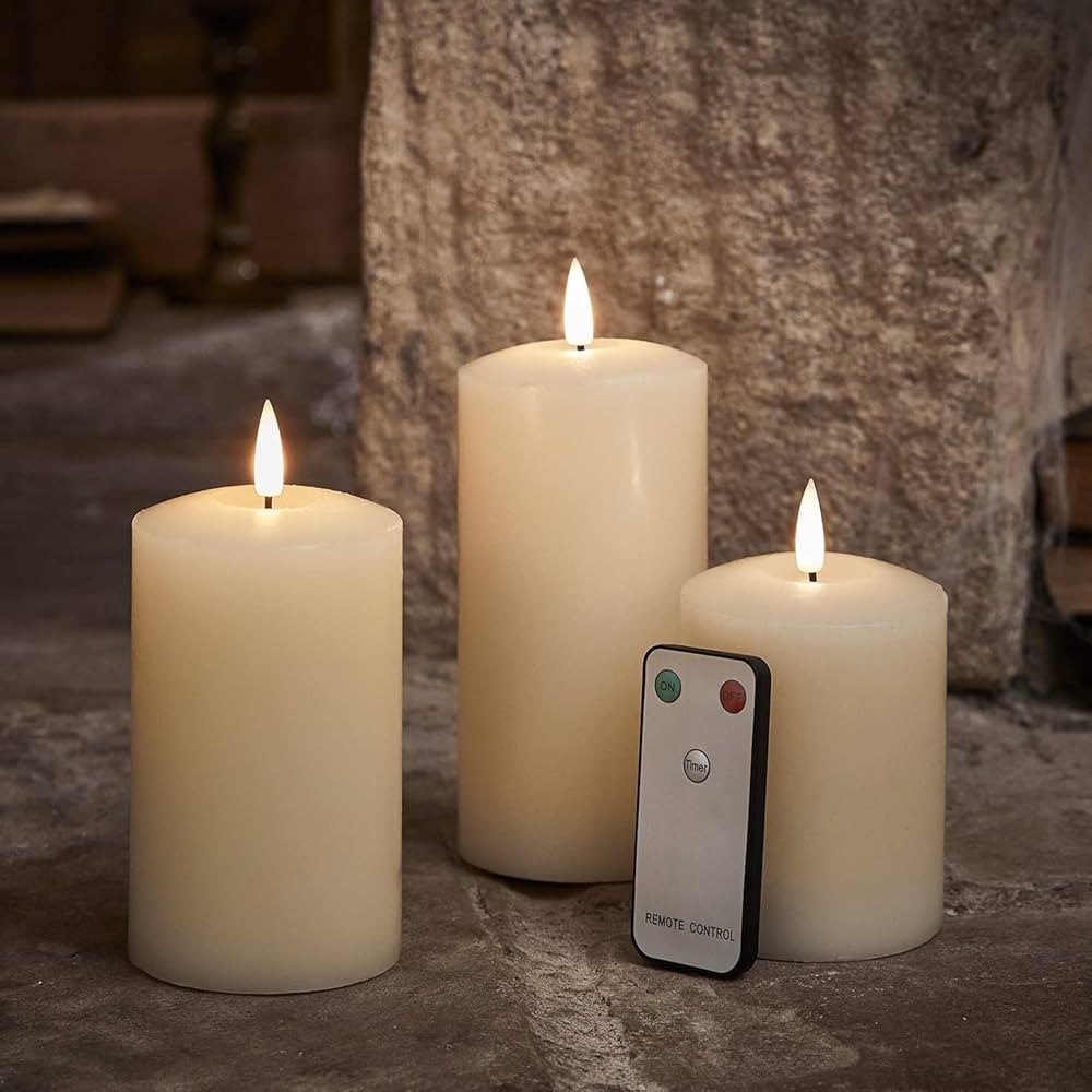 Amazon.com: Lights4fun, Inc. Set of 3 TruGlow Ivory Wax Flameless LED Battery Operated Pillar Can... | Amazon (US)