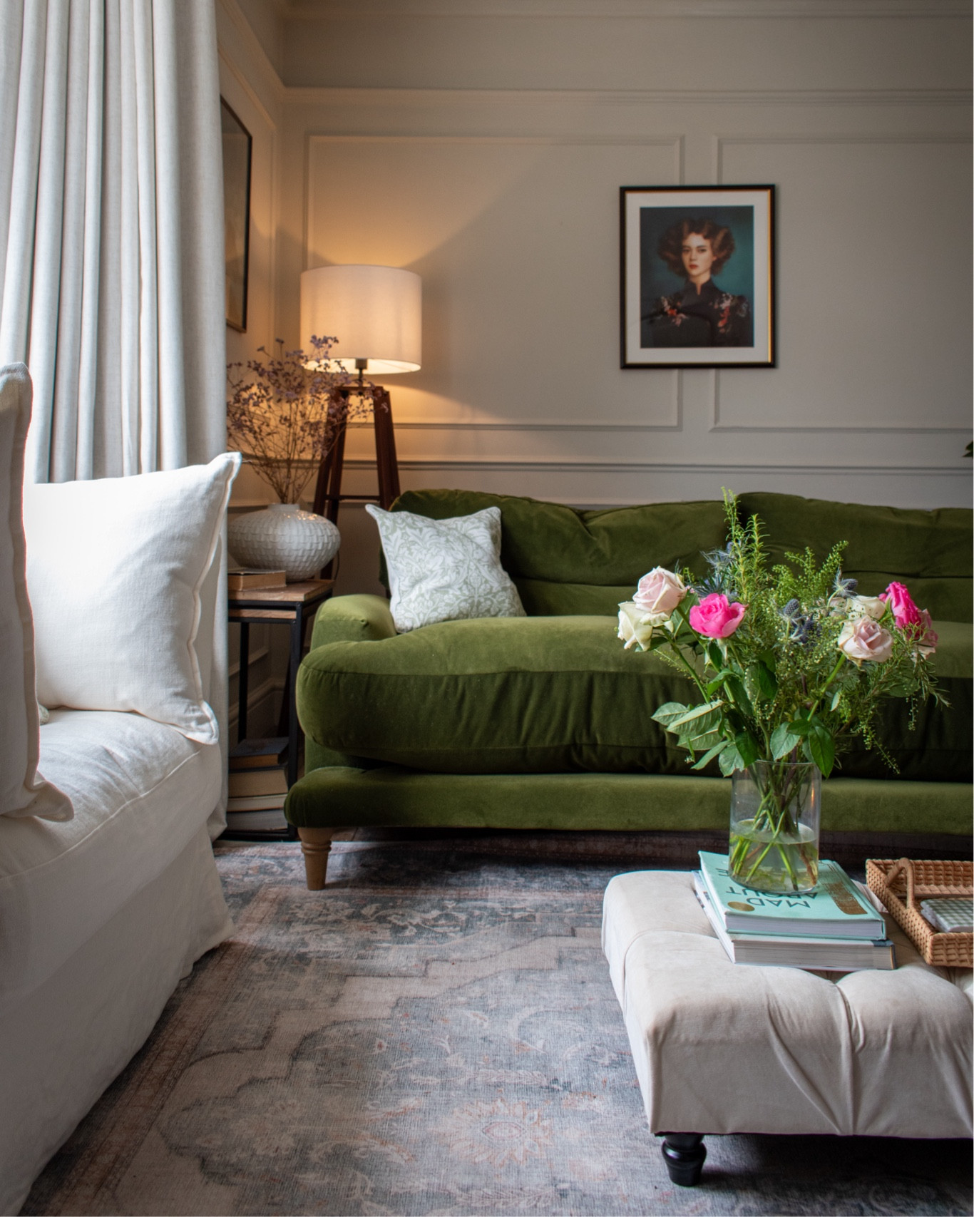 Traditional style living room painted in Farrow and Ball Shaded White, with Ruggable Adeline Sage Rug, Green loaf sofa, green patterned cushion and footstool. 

#LTKeurope #LTKover40 #LTKhome