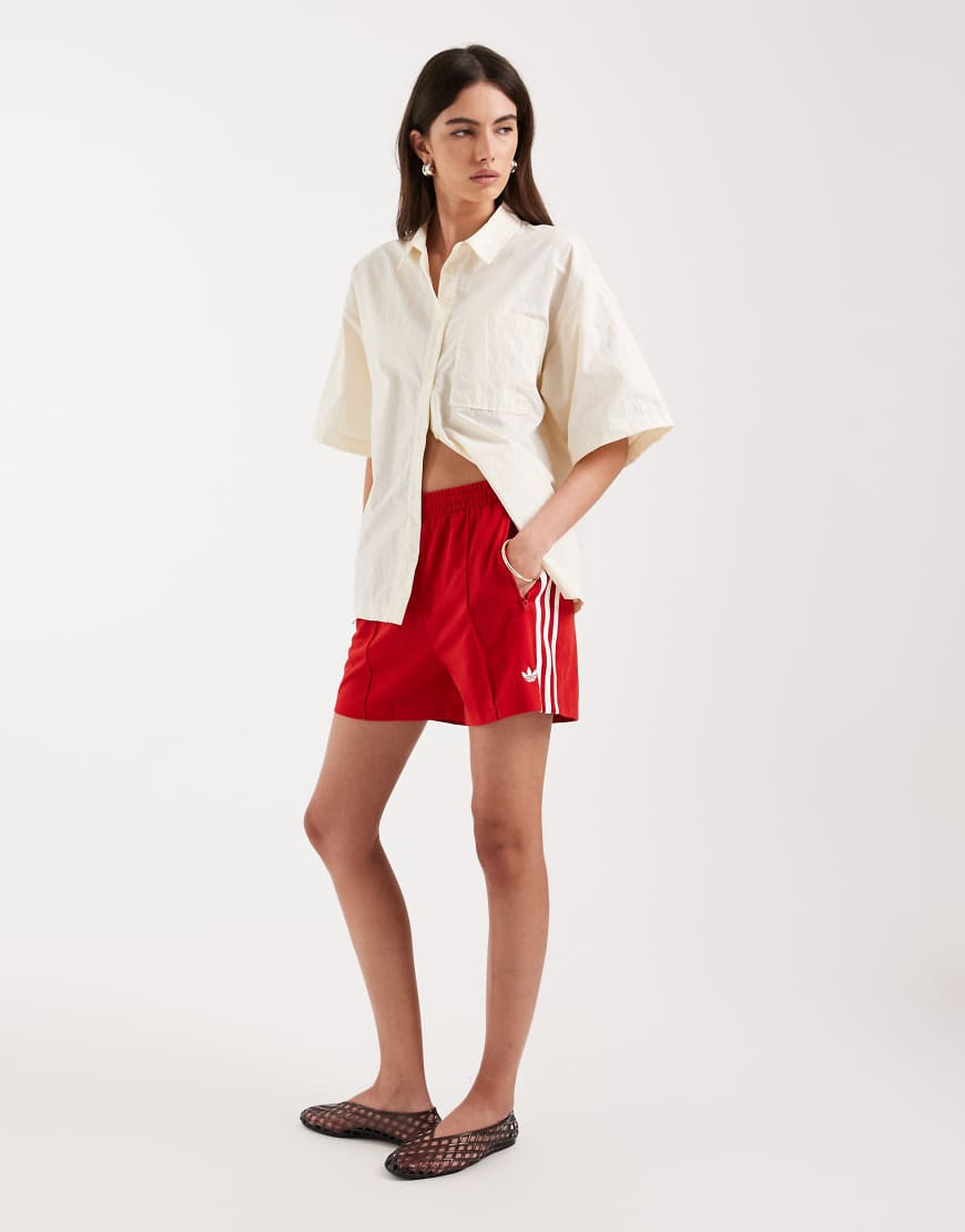 adidas Originals Firebird shorts in red | ASOS (Global)