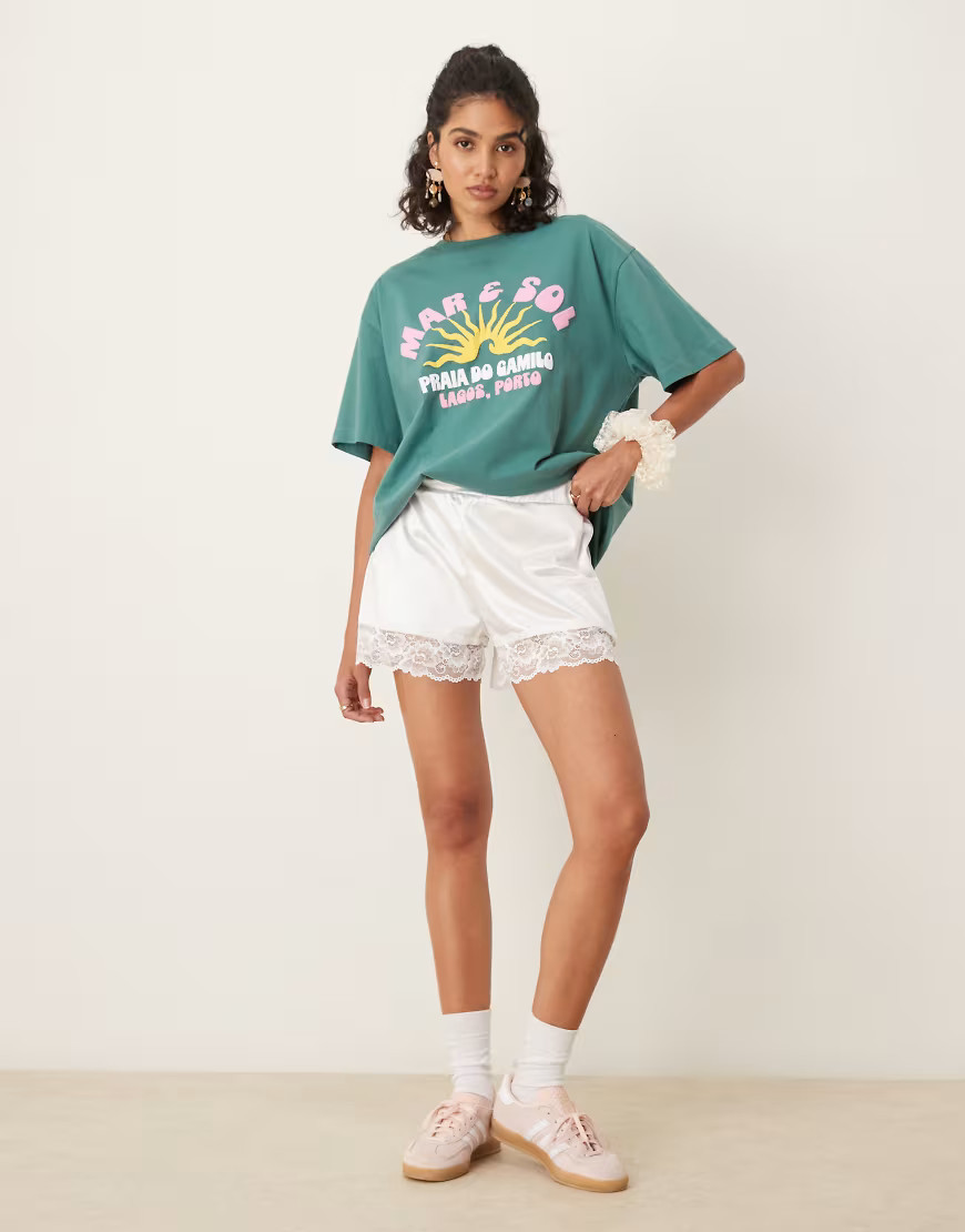 ASOS DESIGN relaxed fit lace trim stretch satin shorts in cream-Gold | ASOS (Global)